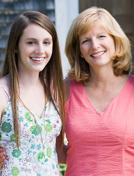 teen girl and woman smiling